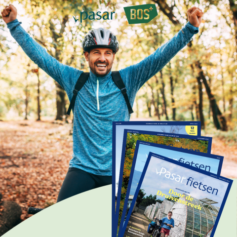 Fietser geniet van het leven dankzij onze magazines en het bos